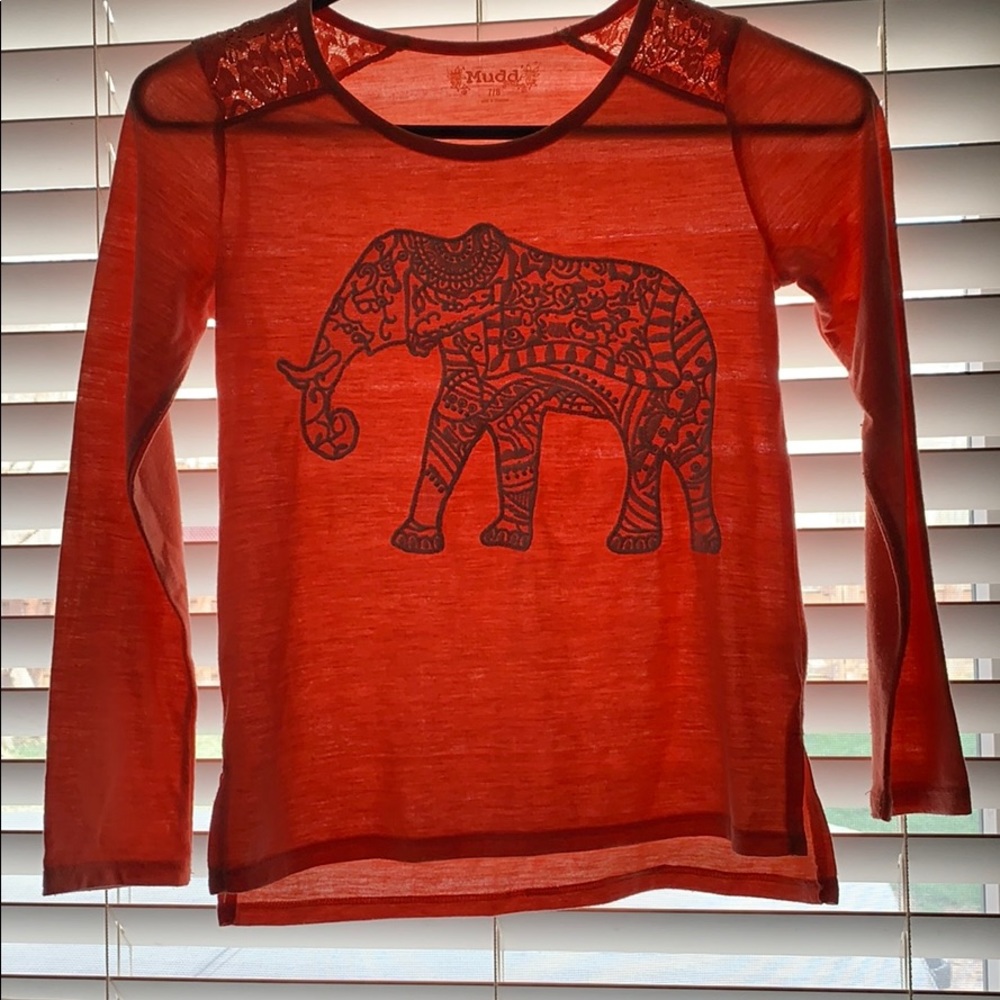 orange elephant shirt with lace on shoulders